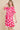 Side View of Feminine Flower Print Dress with Ruched Detail