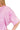 Close-up of bright mauve acid crinkle wash cotton fabric with soft feel