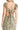 Back view of green maxi dress with smocked bodice and flutter cap sleeves on a model