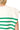 Back view of striped vest showing sleeveless cut and clean back panel.