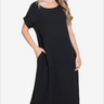 Woman in classic black midi dress with stylish straw hat, perfect for sunny days.