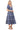 Side view of women's puff sleeve midi dress showing flowy tiered silhouette for summer