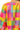 Close-up of multicolor polyester fabric showing stitching and texture of the balloon sleeve