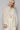 Model front view in boho floral shirt with soft drape and contrast panels