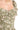 Close-up of green square neck maxi dress with smocked bodice and flutter cap sleeves