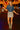 White model in puff sleeve denim crop top with glitter mini skirt and silver boots under carnival lights