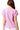 Back view of blouse featuring clean seams and gentle drape