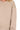 Close-up view of ash mocha fleece fabric showing ribbed hem and elastic waistband detail.