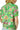 Back view of green floral blouse with rounded neckline and flowy silhouette