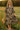 Woman standing in Floral Print Tiered Midi Dress with flats, in flower meadow, golden hour light
