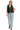 Model wearing heart quilted vest with tie-front closure and pockets
