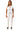 Model front view of off-white knit vest styled over a collared shirt