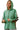 Model wearing oversized French terry hoodie with plaid and stripe mix kangaroo pocket and hood
