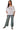 Model wearing square neck babydoll blouse with puff sleeves floral embroidery and ruffle trim