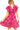 Back view of hot pink paisley mini dress with smocked top and flowy silhouette