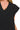 Close-up of ribbed knit in black showing stitch texture and soft surface