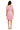 Back view of a model wearing a jacquard checker dress with smocked bodice and tiered design