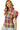 Woman wearing a colorful plaid shirt with puffed sleeves on a white background