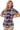 Woman wearing a plaid shirt with purple accents on a white background