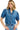 Woman wearing a denim shirt with a collar on a white background