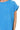 Close-up of deep sky blue ribbed cotton texture and soft crew neckline