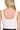 Back view of white seamless tank with smooth rib knit and snug shape