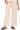 Front view of wide-leg slub knit lounge pants in beige with side pockets and black sandals