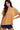 Side view of women's brushed knit top featuring relaxed fit and cozy striped fabric