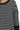 Close-up of a black and white striped sweater