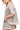 Back view of women's lounge set showing shorts with pocketed detail and soft texture