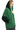 Side view of green hoodie showing oversized cut and shimmering sequin sleeves
