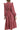 Model back view of dusty rose midi dress with textured fabric