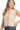 Front view of sand beige cropped sweater vest showing tie closure and ribbed design.