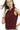 Side view of maroon zip front vest highlighting fitted shape and clean seams.