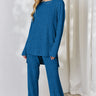 Elegant ribbed high-low top and wide leg pants set, perfect for versatile styling, front view.