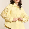 Elegant button-down lace detail waffle shirt with long sleeves, front view.