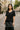 Black crochet top with satin midi skirt for an elevated day-to-night outfit transition
