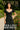 Asian Women's black midi dress with white polka dots, puff sleeves, and tie front styled for a retro-inspired look.