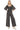 Black mineral wash ruched wide leg jumpsuit, perfect for versatile fashion.