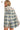 Back view of blue plaid flannel shirt, highlighting seamless structure.