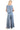 Back view of women's woven set, showcasing easy silhouette and coordinated design.