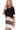 Side view of color block tee showing loose fit and sleeve detail.