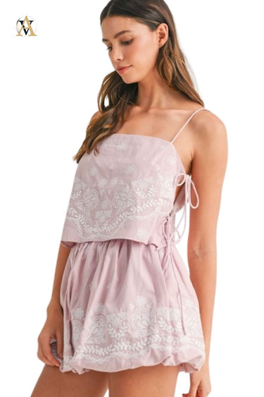 Side view of light mauve set, showcasing balloon silhouette and delicate embroidery.