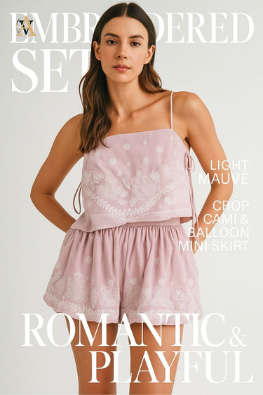 Woman in mauve embroidered cami and matching balloon mini skirt, styled for feminine summer occasions.