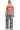 Back view of women's neon sweater with bold knit textures and relaxed drape