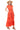 Side view of the orange tiered maxi dress showing its elegant flow and structured waist.