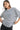 Women's white and navy striped tee front view with oversized fit and coastal vibe