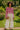 Pink chevron crochet top with floral hem styled for summer in the garden