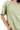 Close-up of mineral wash and ribbed knit texture with exposed seams.