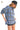 Side view of plaid polo shirt, showcasing the high-low hem and relaxed fit.